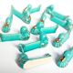 Set of 12 turquoise blue and gold duck knife holders mid-20th century