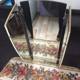 Hairdresser of the 50s and 60s with triptych mirror
