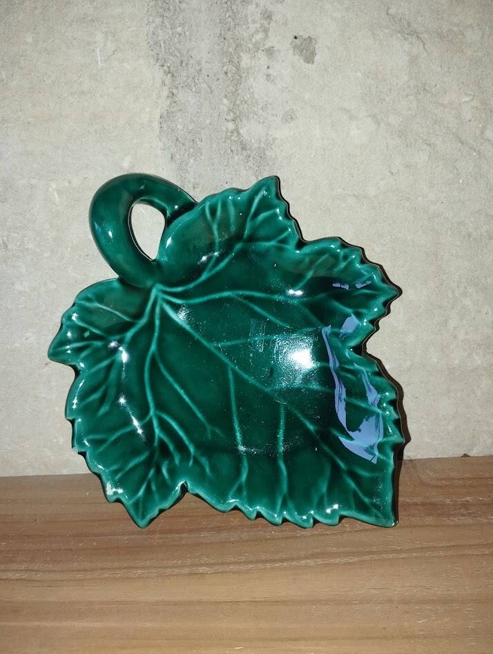 Charming ceramic dish in the shape of a leaf, signed Vallauris, in