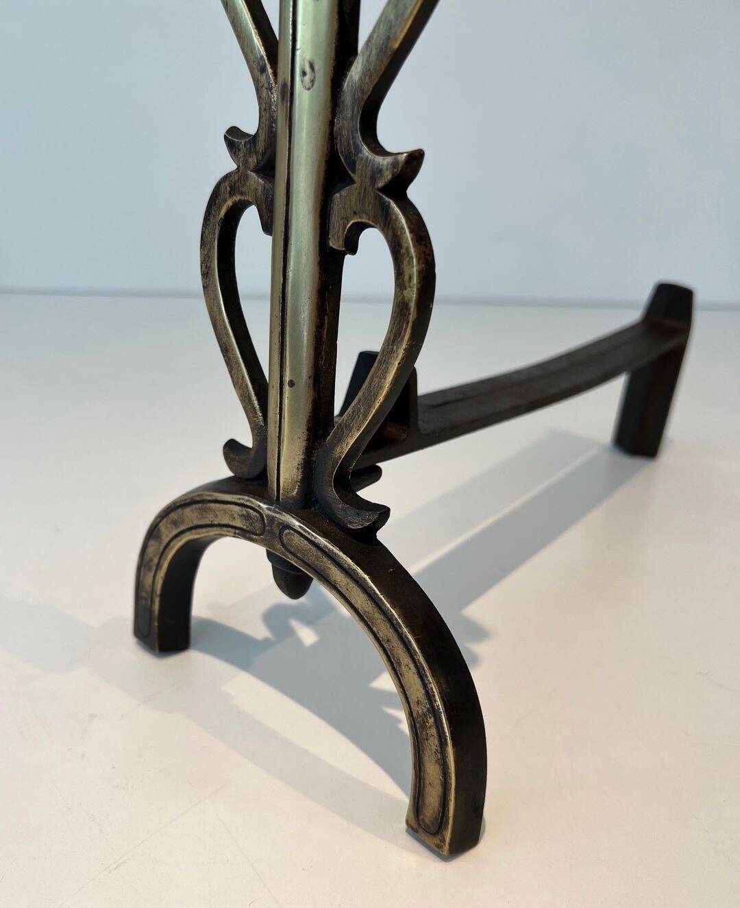Pair of Brass and Wrought Iron Chenets with Triple Volute and Mount Torch Holders