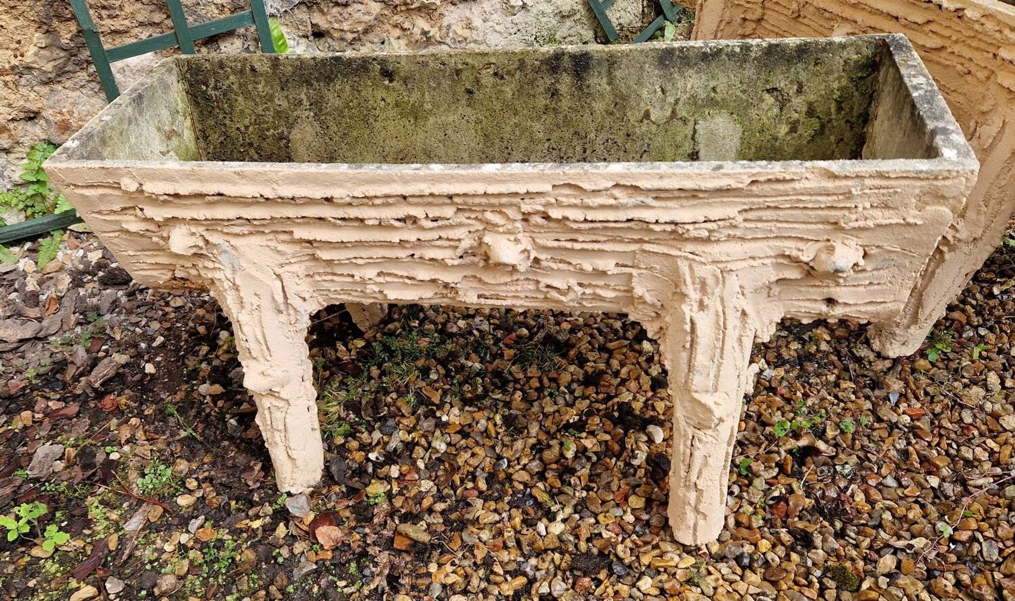 Pair of cement planters in faux wood finish