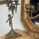 Set of 3 antique three-branch candelabras with cherubs and bronze patina.