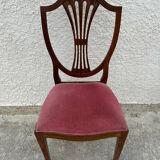 Set of 6 wooden chairs sitting red