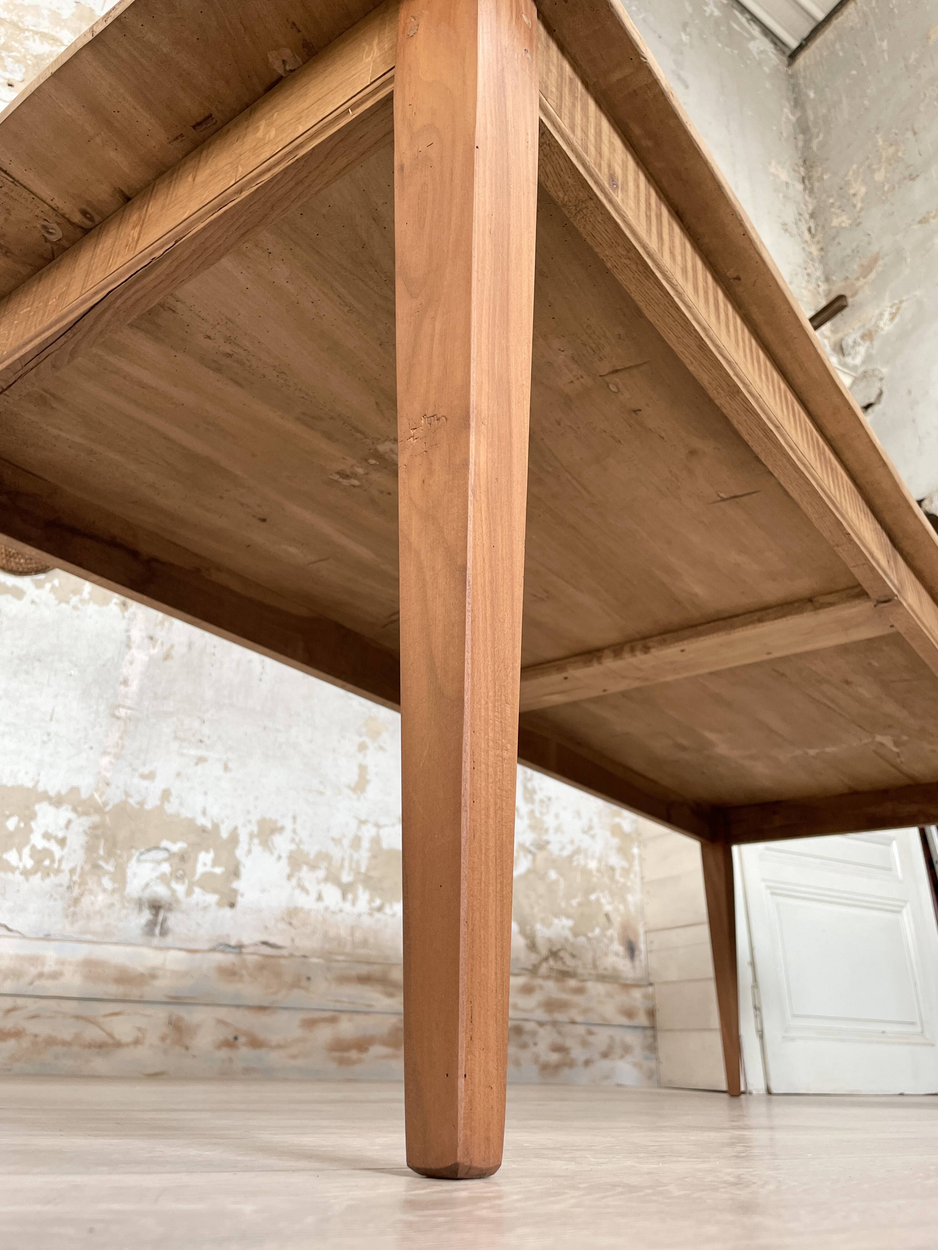 Vintage farm table with spindle legs.