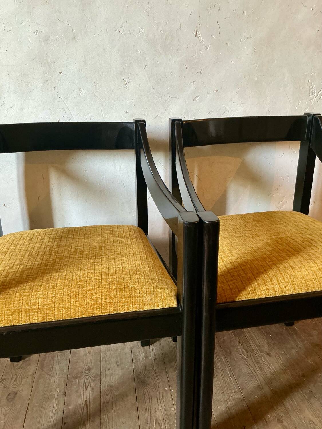 Four designer armchairs