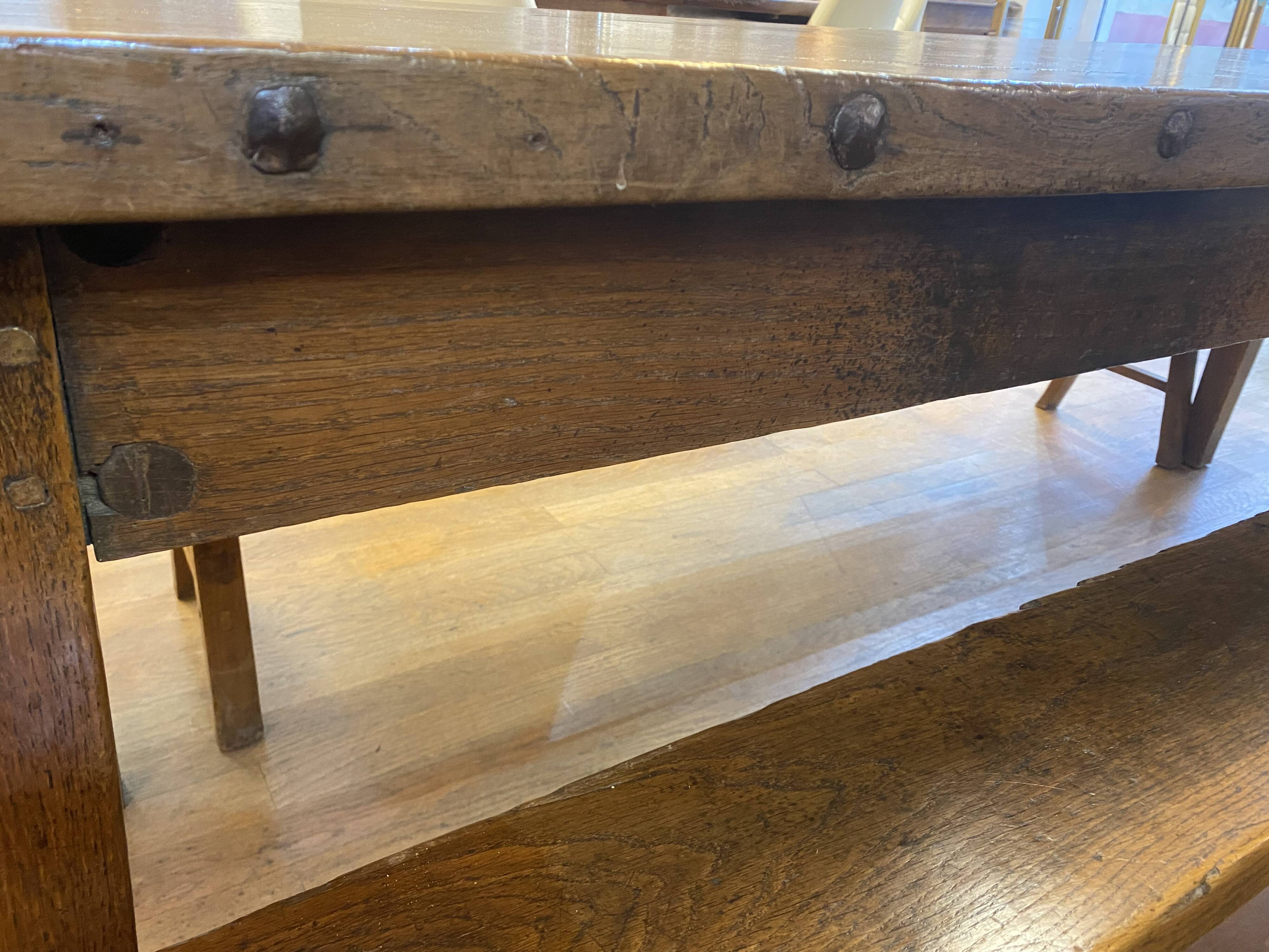 Farm table with its 2 benches.