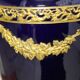 Vase signed Legastelois in blue ceramic of Sèvres and gilded bronze