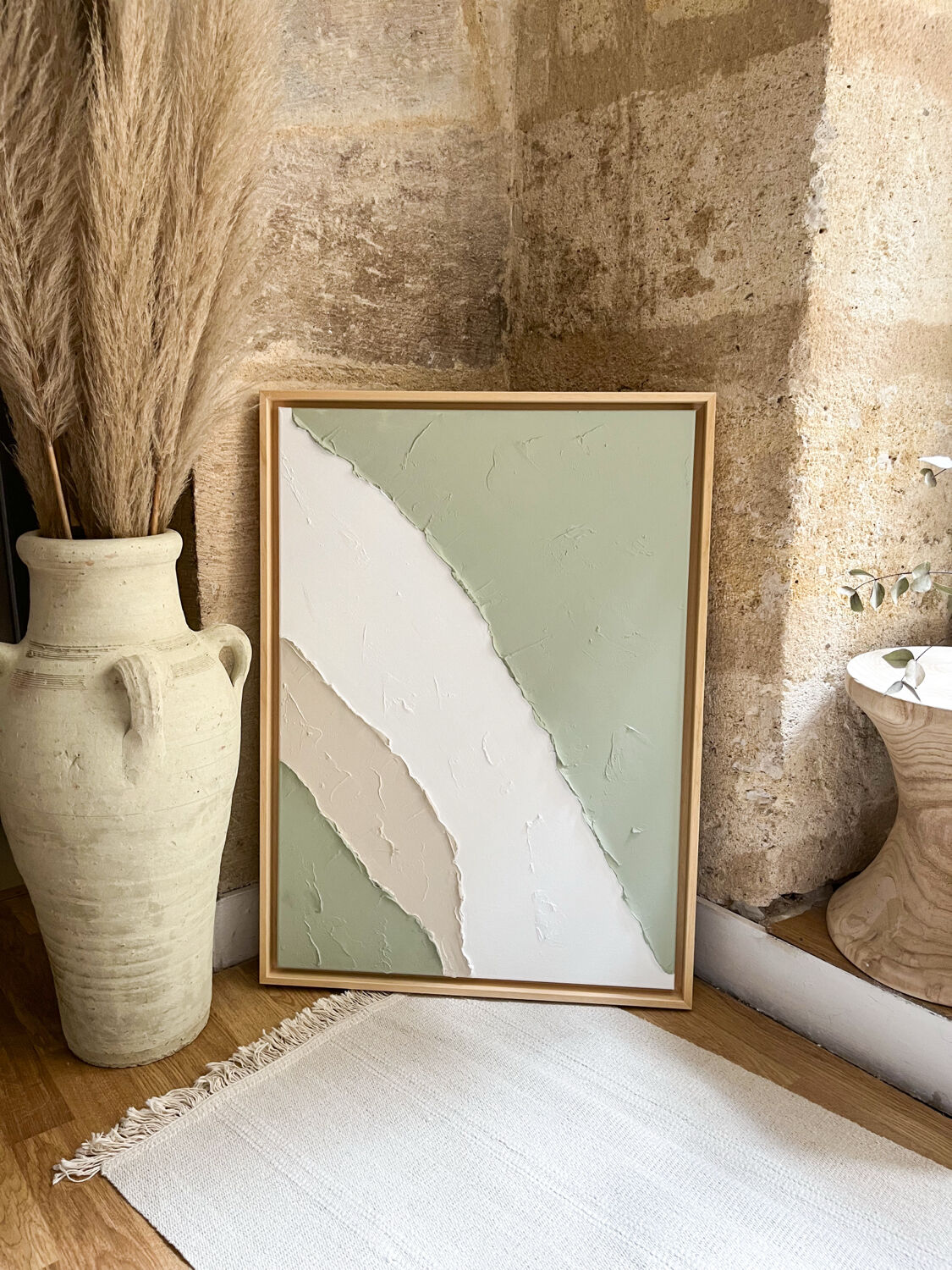 Beige, white, sage green relief table.