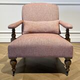 Wooden armchair and fabric with red chevron pattern with casters