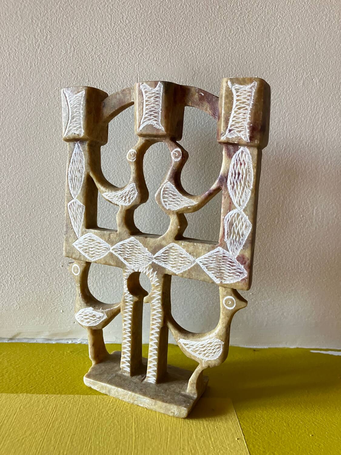 Vintage stone folk art candle holder