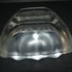 Lalique glass ashtray bowl with frosted finish, engraved with wave design, signed Lalique.
