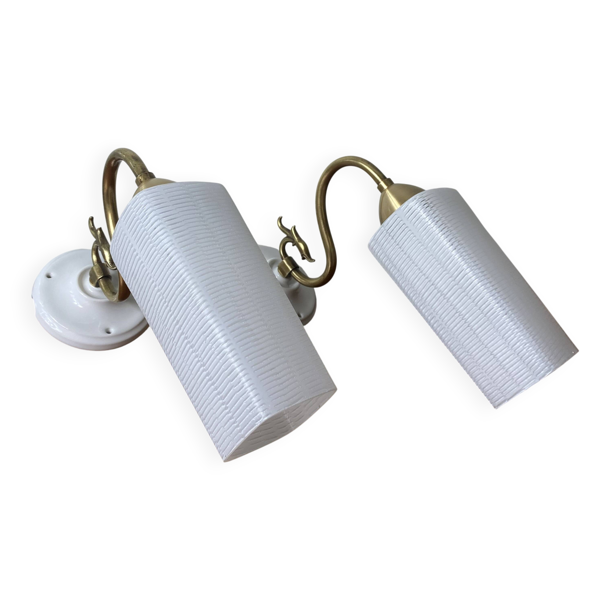 Pair of swan neck wall lights in brass, white glass and porcelain.
