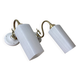 Pair of swan neck wall lights in brass, white glass and porcelain.