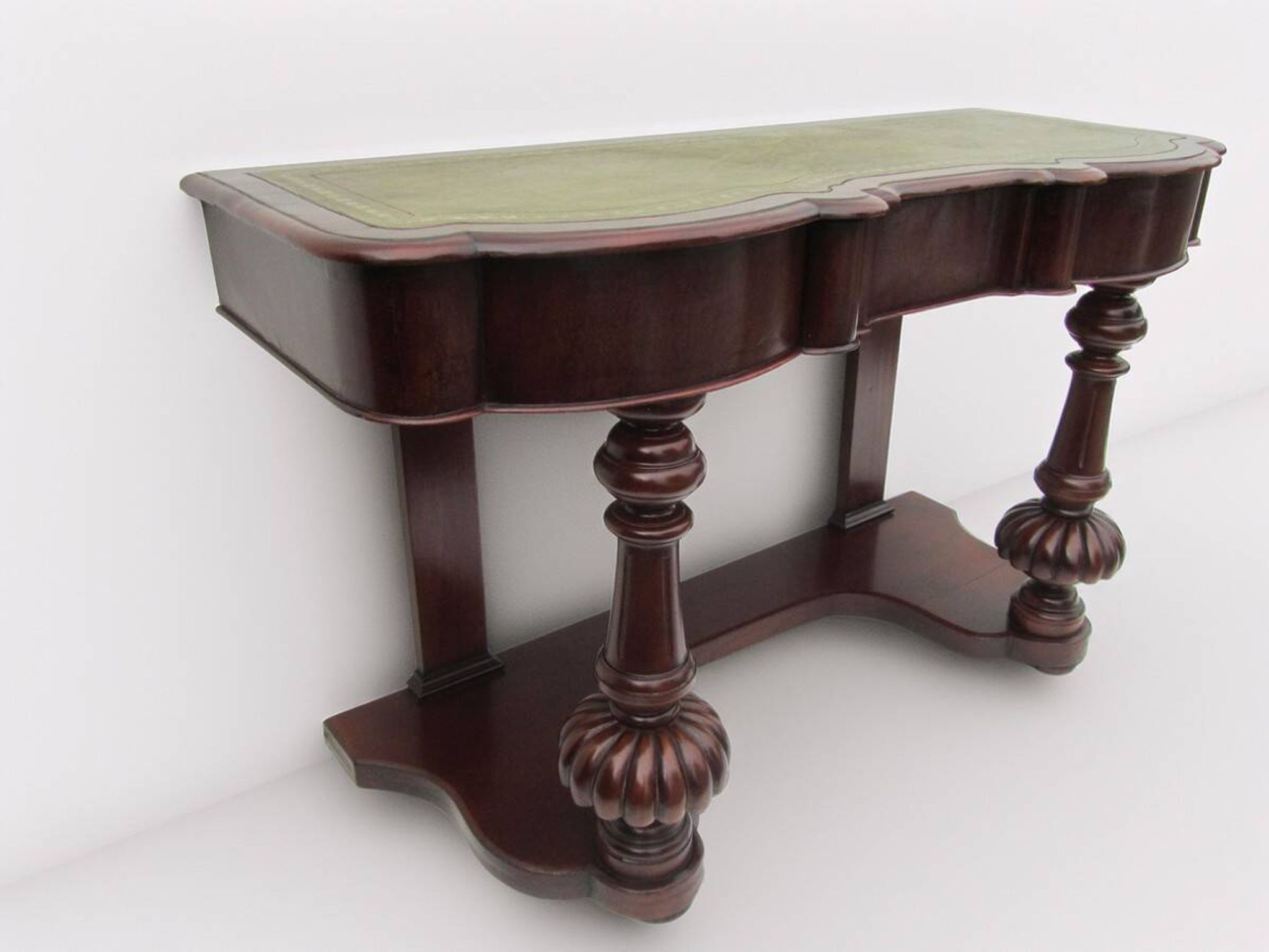 Mahogany and green leather console, 1860-70