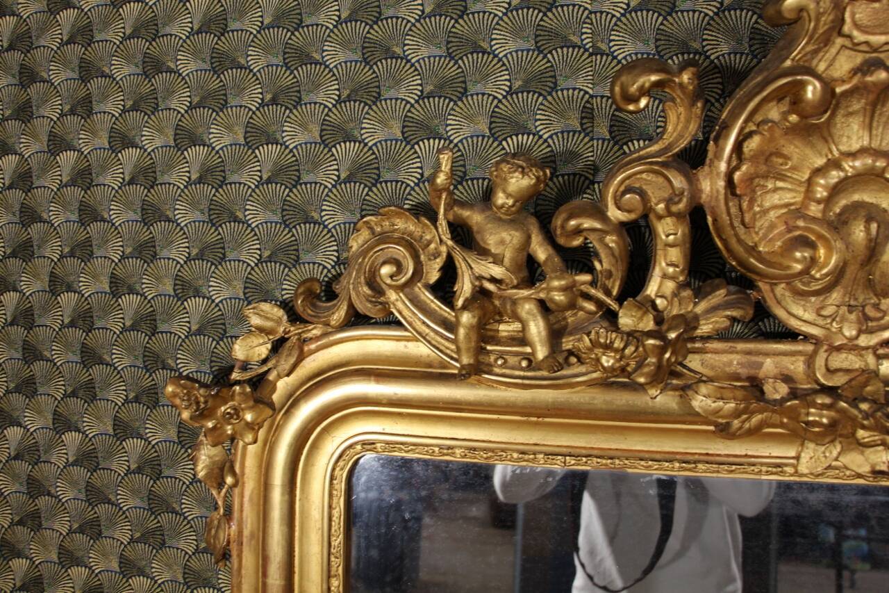 Louis Philippe mirror decorated with Putti