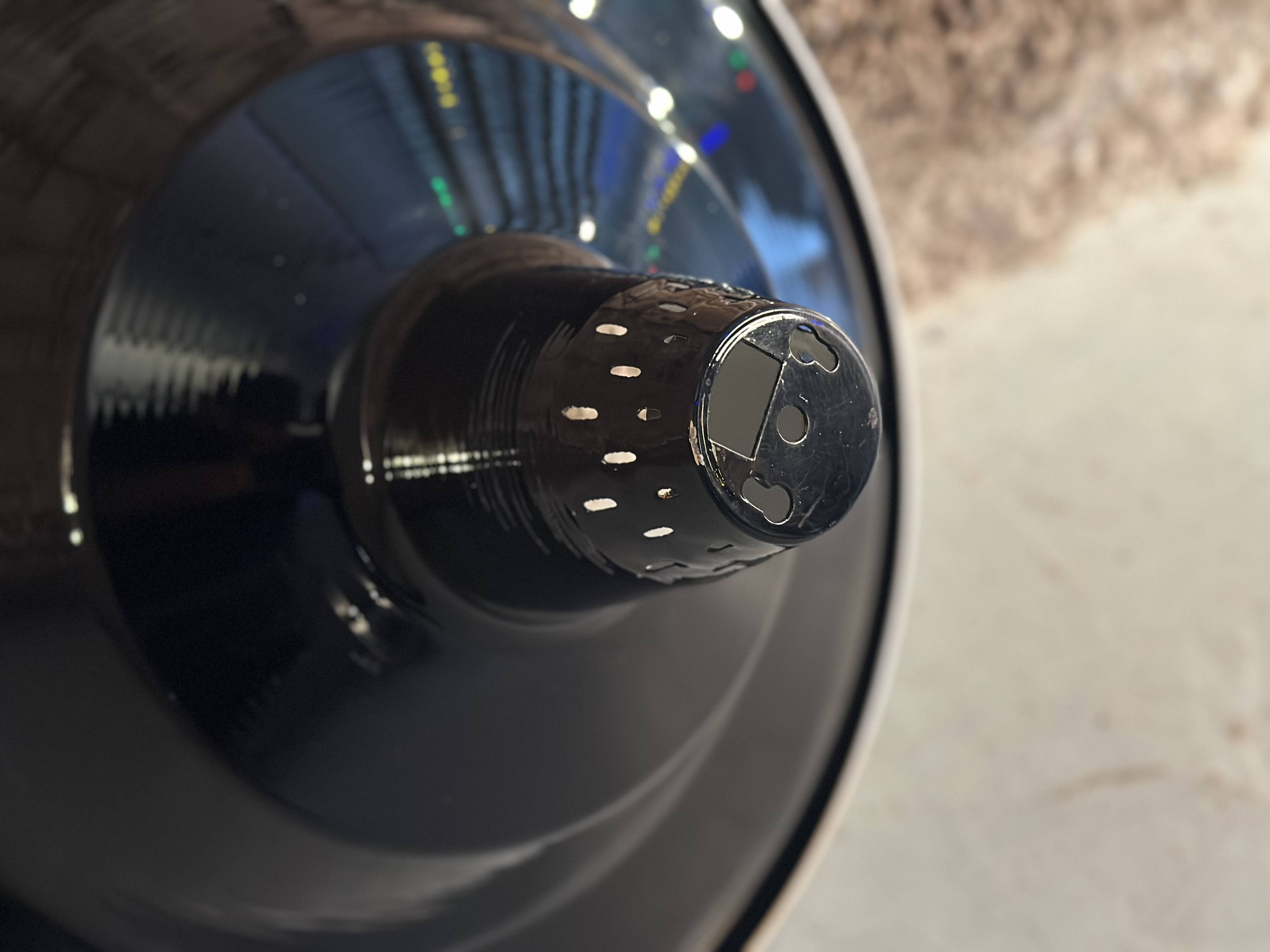 Large industrial pendant lampshade in black enamelled sheet metal.