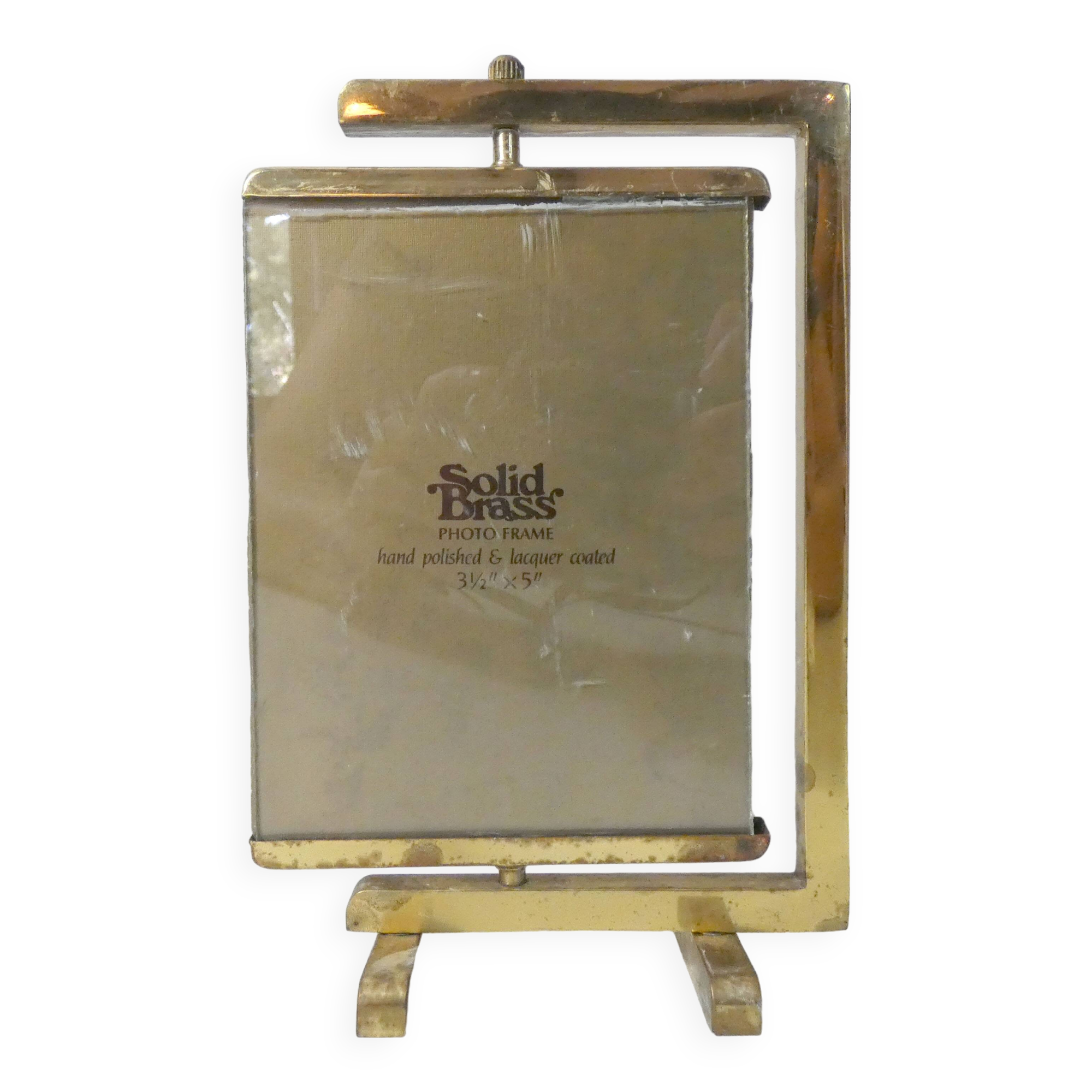 Double-sided carousel photo frame in gold metal