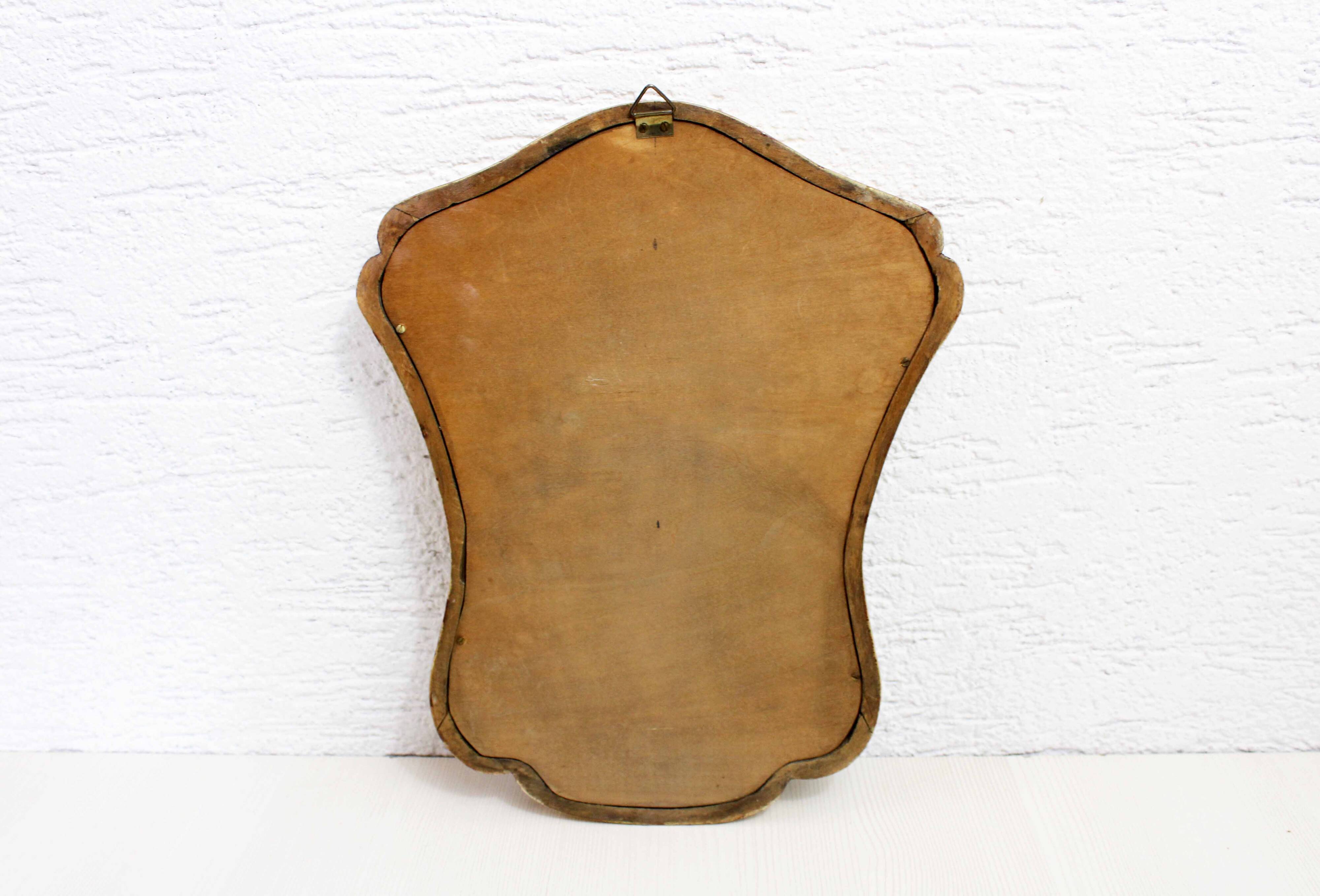 Mirror in gilded wood with leaf