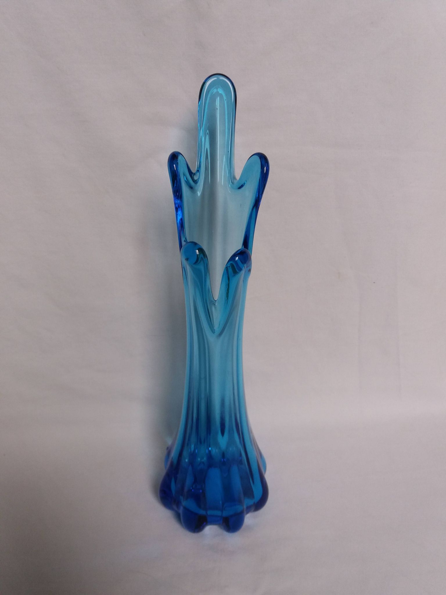 Turquoise blue blown glass vase