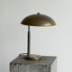 Bauhaus style table lamp in patinated brass from the 1930s.