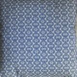 Blue cushion with royal pattern