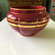 Large burgundy and gold vase