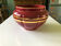 Large burgundy and gold vase