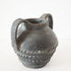 Vase with double handle in black sandstone