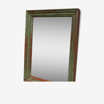 Old wooden mirror with green patina