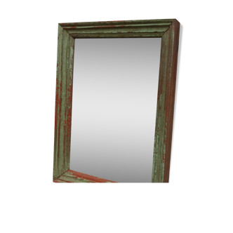 Old wooden mirror with green patina