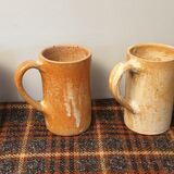 Suite of 4 sandstone mugs