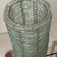 Blue-tinted glass lamp and wire.