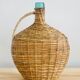 Bouteille Viresa en verre et osier