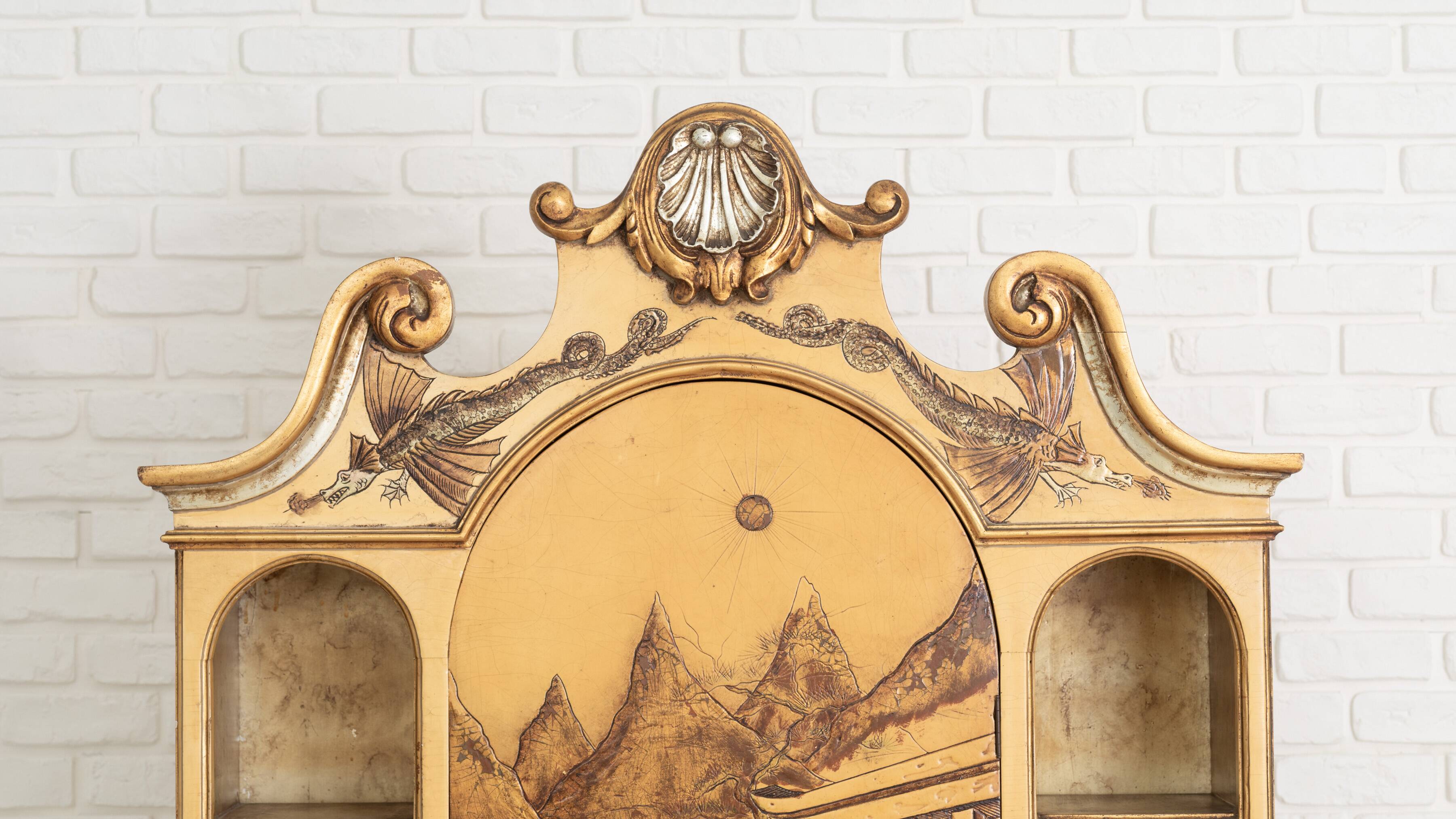 Desk with oriental motifs in relief