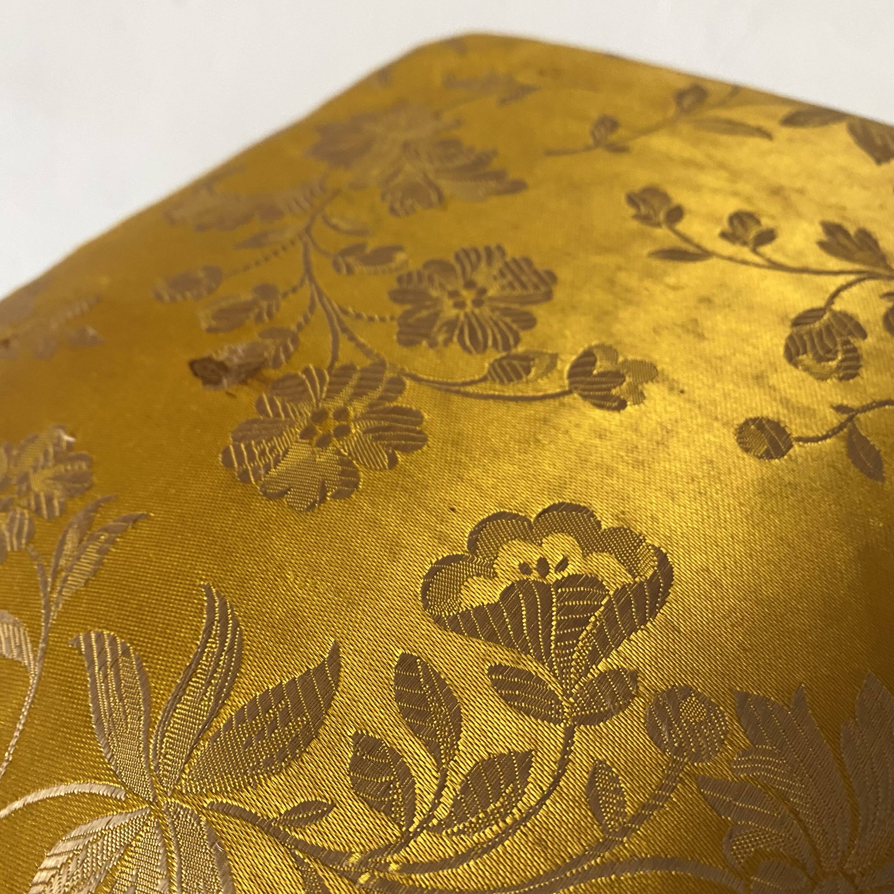 Low stool with antique wood and fabric footrest