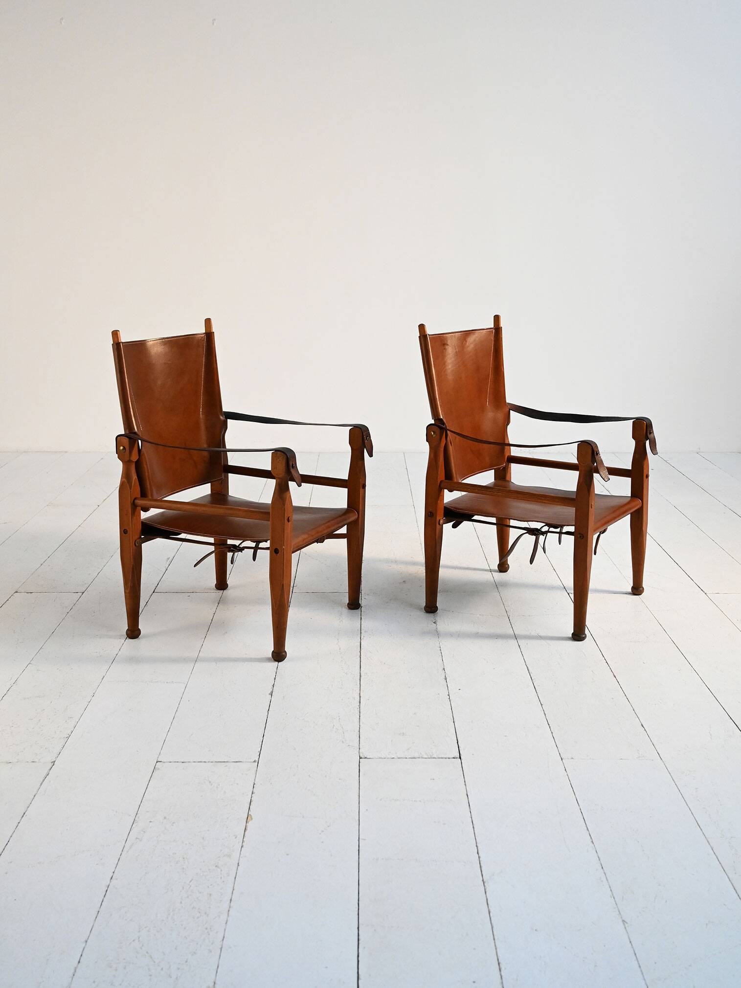 Pair of Scandinavian leather safari chairs