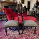 Fake pair of low Napoleon III chairs in blackened wood.