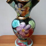 Vallauris vase flowers on black background