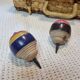 Duo of old spinning tops