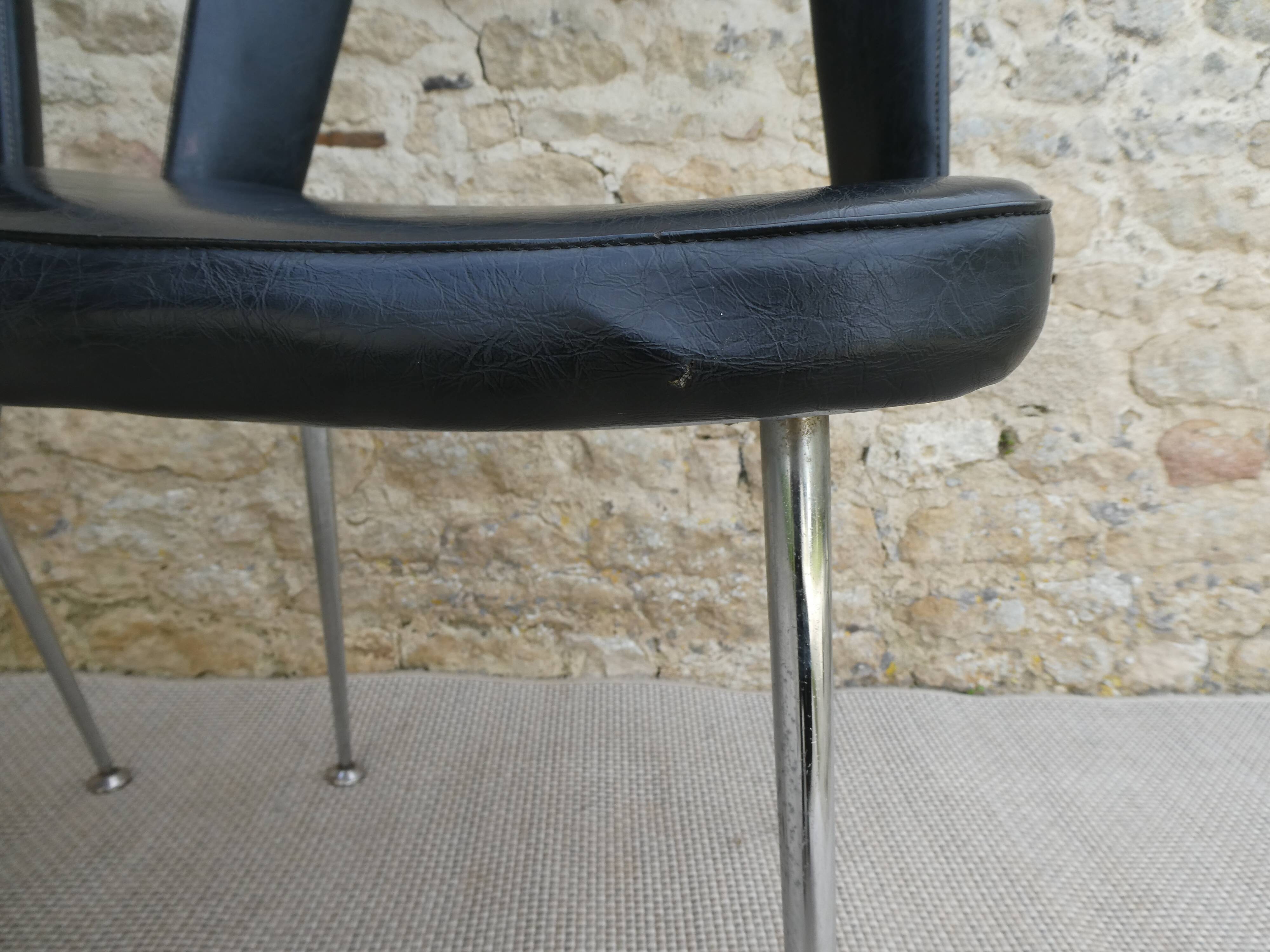 Pair of office chairs in chromed metal and skaï, 60s