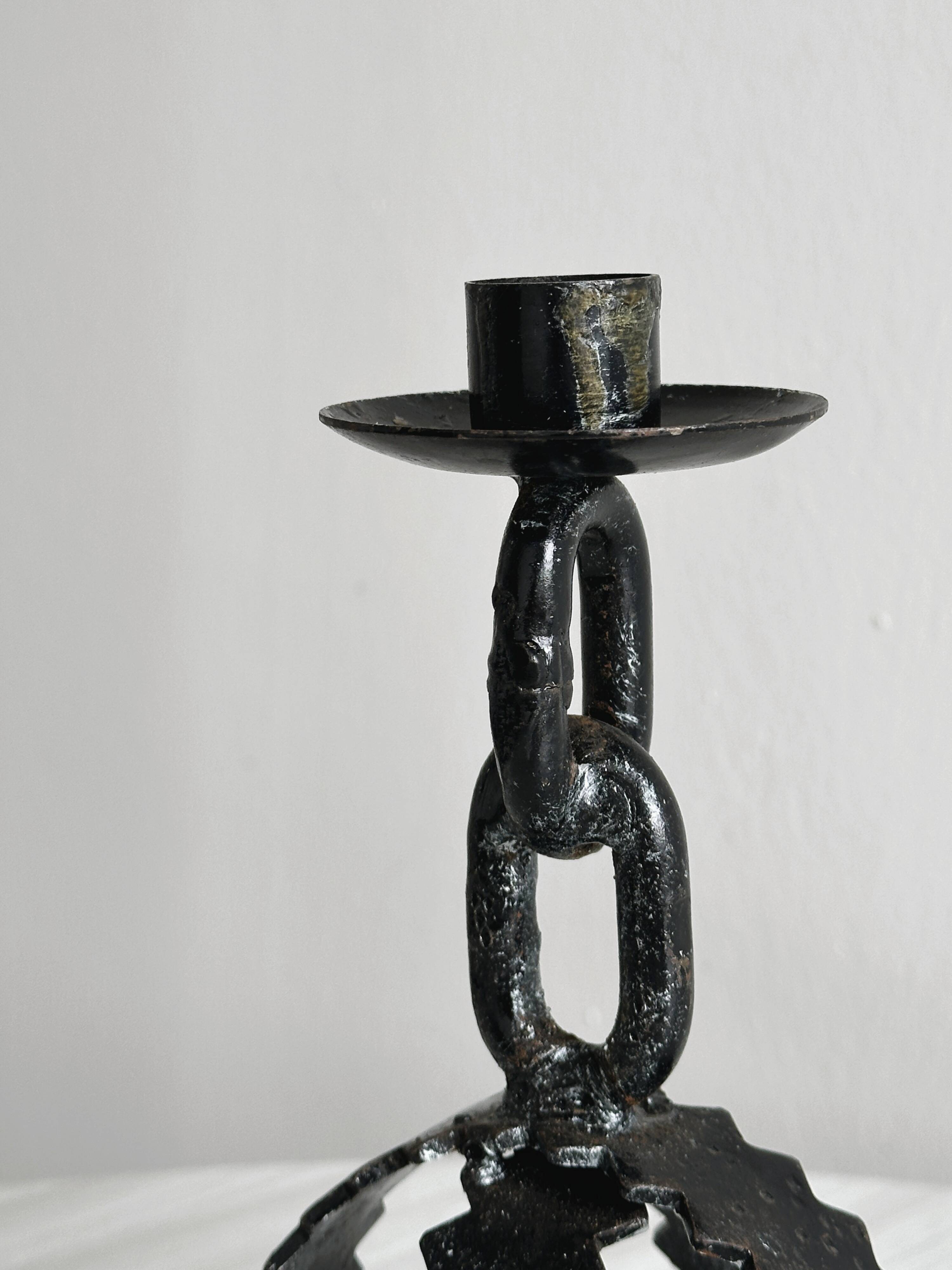Black forged metal candle holder