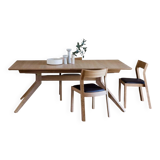 Wooden dining table with a cross extension.