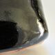 Vase bouteille grès émaillé noir par Roland Zobel