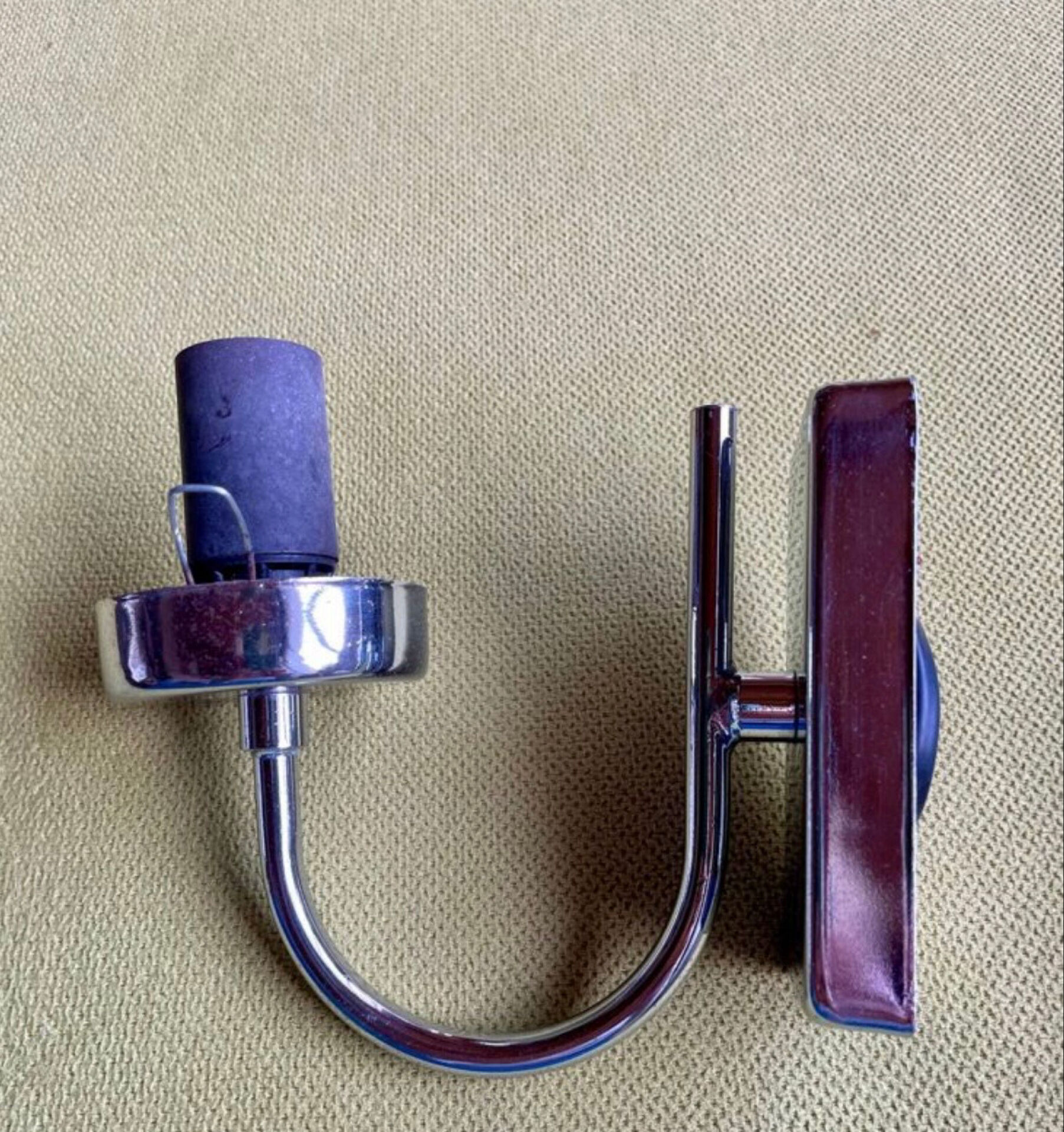 Pair of chrome metal wall lights with white glass globe.