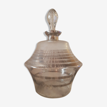 Old carafe with blown glass liqueur, silver thread