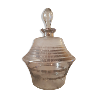 Old carafe with blown glass liqueur, silver thread