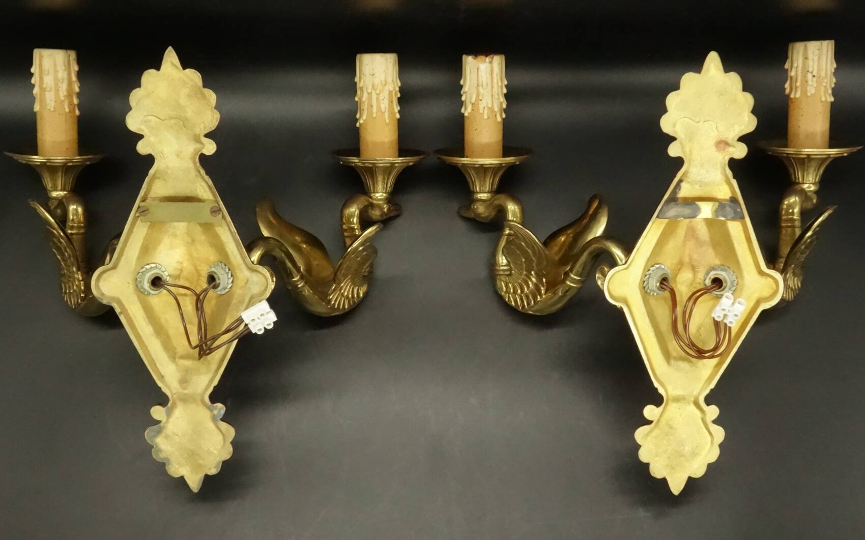 Pair of Empire style swan wall lights from Petitot - bronze & green patina
