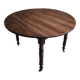 Antique drop-leaf dining table in walnut, France, circa 1900.