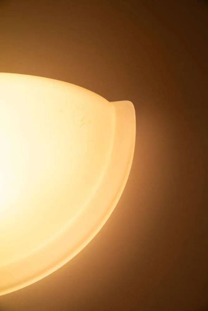 Space Age glass wall lamp by Peil & Putzler, minimalist.