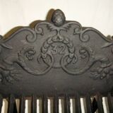 Log holder, old cast iron andiron